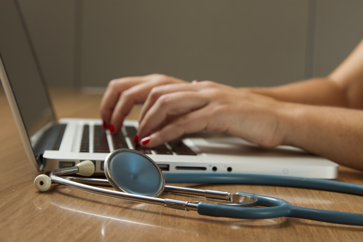 Healthcare professionals reviewing patient care information
