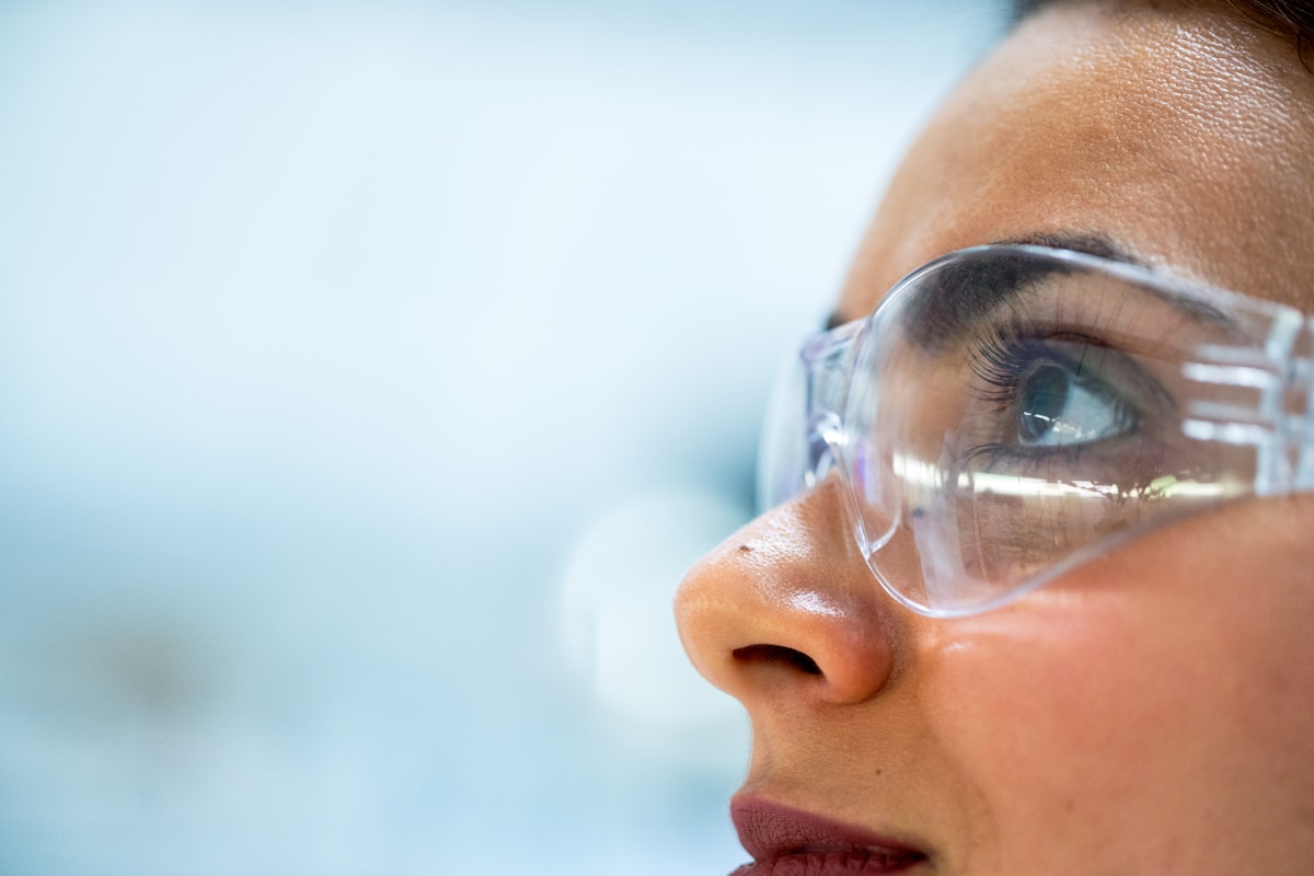 Research professional analyzing clinical data in a modern laboratory